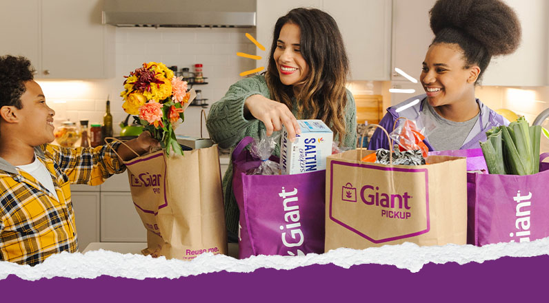 Family unpacking groceries