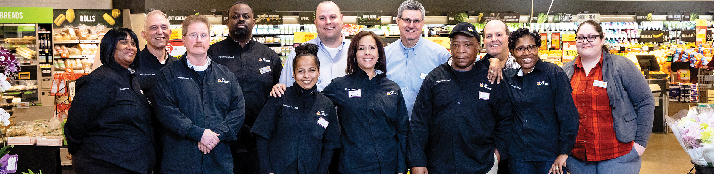 group of store employees and managers