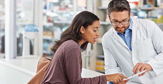 Pharmacist and customer